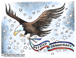 In this cartoon, a bald eagle holds a red, white and blue banner that reads "defend democracy" from its talons. The eagle is surrounded by a stars and a blue background.