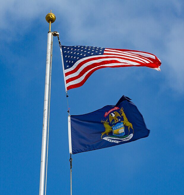 The U.S. flag and the Michigan state flag